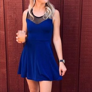 Blue with black mesh party dress. Size small. Recently dry cleaned.